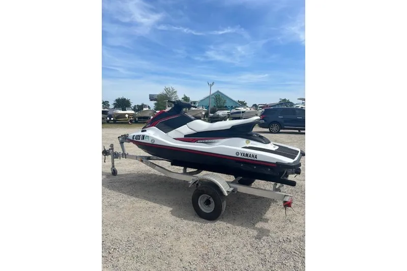 Slide: The Image of 2019 Yamaha WaveRunner EX on trailer, parked outdoors under clear sky. - 4