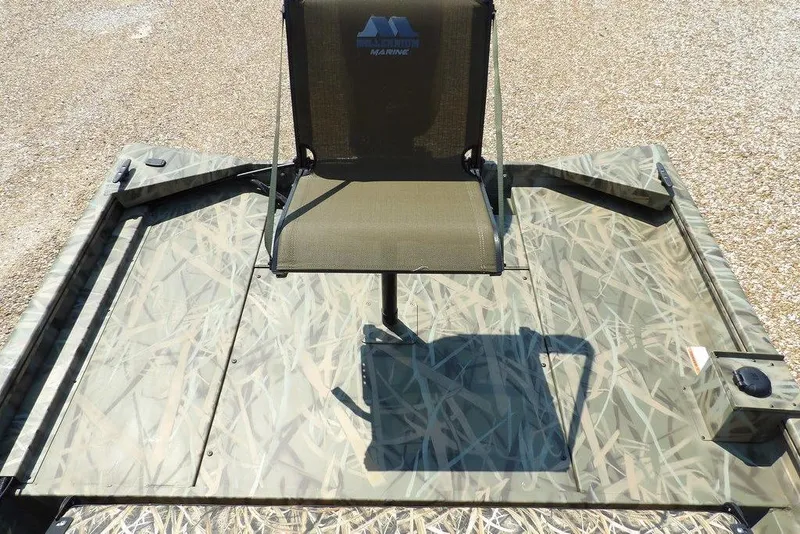 Slide: The Image of 2026 Crestliner 1760 Retriever SC boat with camouflage deck and swivel chair. - 17