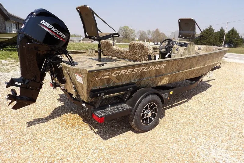 Slide: The Image of 2026 Crestliner 1760 Retriever SC boat with Mercury engine on a trailer. - 6
