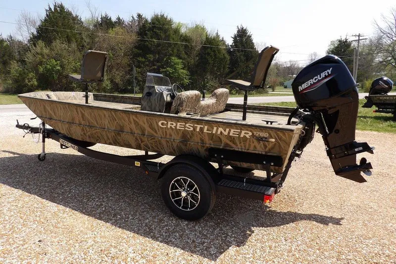 Slide: The Image of 2026 Crestliner 1760 Retriever SC boat with Mercury engine on trailer. - 8