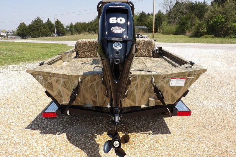 Slide: The Image of 2026 Crestliner 1760 Retriever SC boat with camouflage design and Mercury 60 outboard motor. - 9