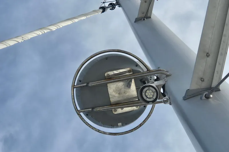 Slide: The Image of View of mast and rigging on 2016 Beneteau Oceanis 55 sailboat against cloudy sky. - 19