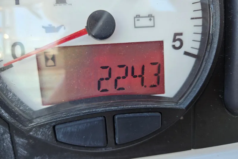 Slide: The Image of Close-up of a Beneteau Oceanis 55 gauge displaying 2243 hours. - 24