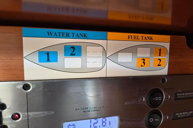 Slide: The Image of Control panel for water and fuel tanks on a 2016 Beneteau Oceanis 55 yacht. - 48