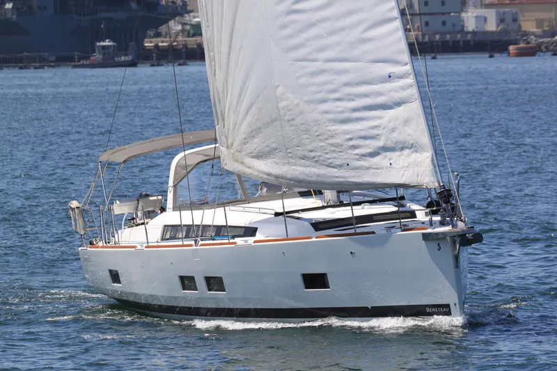 Slide: The Image of 2016 Beneteau Oceanis 55 sailing yacht on open water, showcasing elegant design and performance. - 66