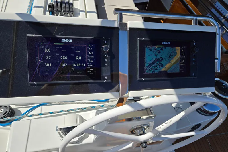 Slide: The Image of B&G navigation displays on 2016 Beneteau Oceanis 55 yacht, showing sailing data and map. - 8