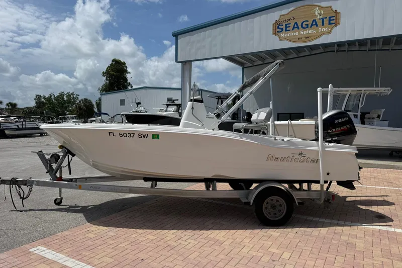 Slide: The Image of 2021 NauticStar 191 Hybrid boat on trailer at Seagate Marine Sales. - 2
