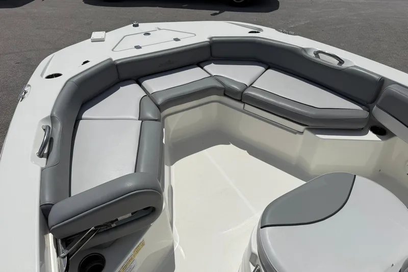 Slide: The Image of 2021 NauticStar 191 Hybrid boat with gray cushioned seating in the bow area. - 21