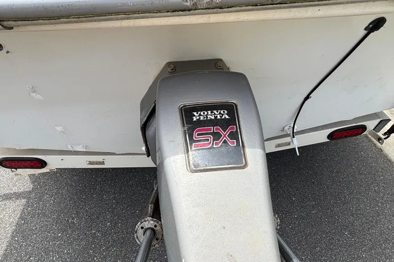 Slide: The Image of Rear view of a 2001 Larson 210 I/O boat with Volvo Penta SX drive. - 11