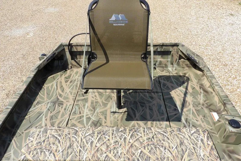 Slide: The Image of 2026 Crestliner 1760 Retriever FCC boat with camo seating and flooring. - 14