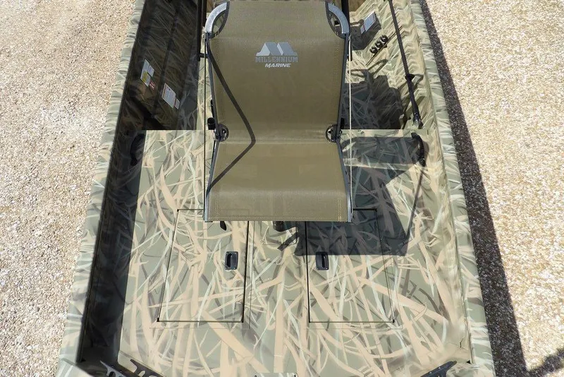 Slide: The Image of 2026 Crestliner 1760 Retriever FCC boat with camouflage design and central seating. - 17