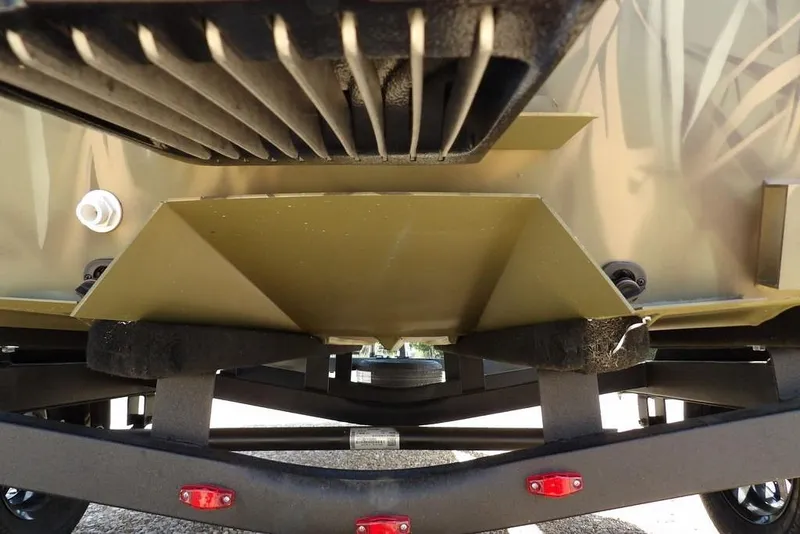 Slide: The Image of Underneath view of 2026 Crestliner 1760 Retriever FCC boat on trailer. - 33