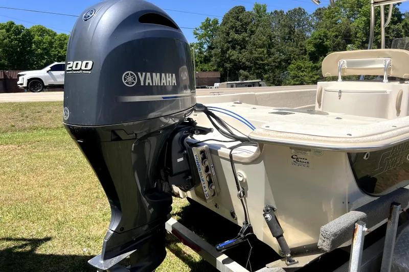 Slide: The Image of 2018 Carolina Skiff 258 DLV with Yamaha 200 outboard motor on trailer. - 7