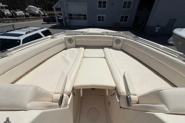 Slide: The Image of 2018 Grady-White Freedom 325 boat interior with spacious seating and sleek design. - 20