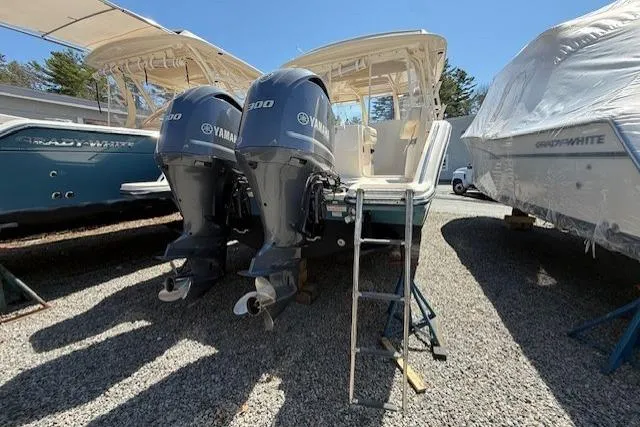 Slide: The Image of 2018 Grady-White Freedom 325 boat with twin Yamaha 300 engines on display. - 5