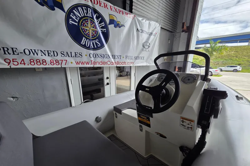 Slide: The Image of Interior view of a 2026 Northstar Vega 3.8 boat with Tohatsu 30HP engine. - 4