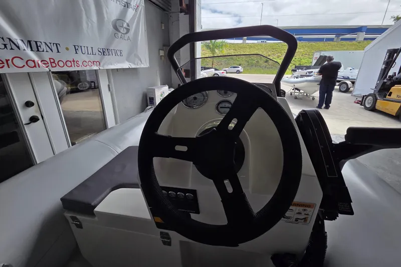 Slide: The Image of Interior view of 2026 Northstar Vega 3.8 boat with Tohatsu 30HP engine. - 6