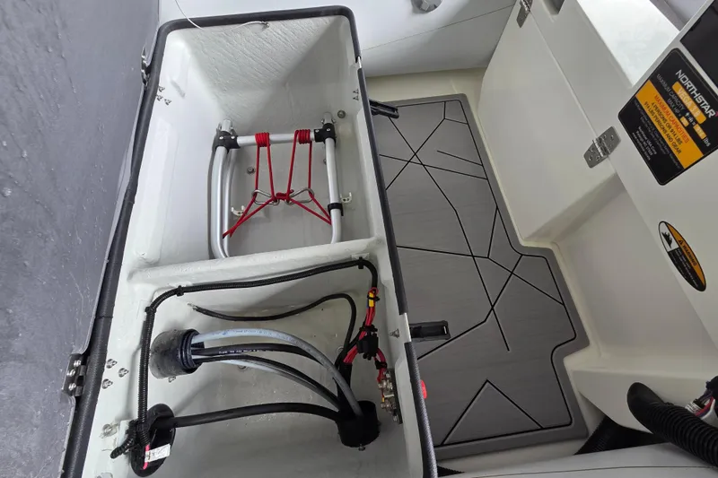 Slide: The Image of Interior view of 2026 Northstar Vega 3.8 boat with Tohatsu 30HP engine components. - 7