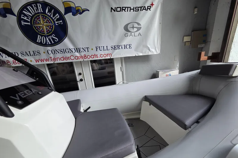 Slide: The Image of Interior of a 2026 Northstar Vega 3.8 boat with Tohatsu 30HP engine. - 9