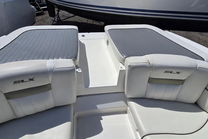 Slide: The Image of 2007 Sea Ray SLX 250 boat interior with gray and white seating. - 20
