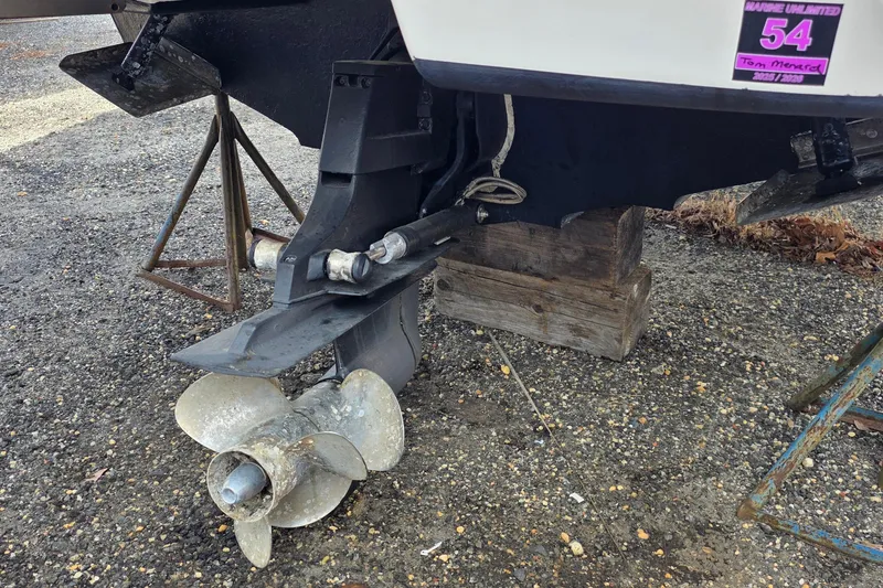 Slide: The Image of Propeller and stern drive of a 2007 Sea Ray SLX 250 boat on a stand. - 6