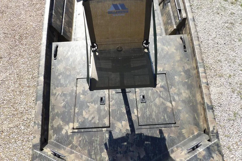 Slide: The Image of 2026 Crestliner 1860 Retriever Deluxe boat with camouflage design and seating. - 22