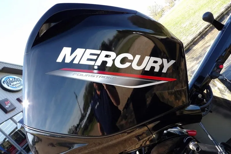 Slide: The Image of Mercury FourStroke engine on 2026 Crestliner 1860 Retriever Deluxe boat, outdoor setting. - 23