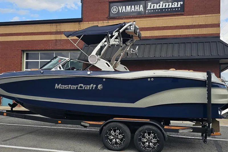 Slide: The Image of 2020 MasterCraft X24 boat on trailer outside Yamaha Indmar building. - 15