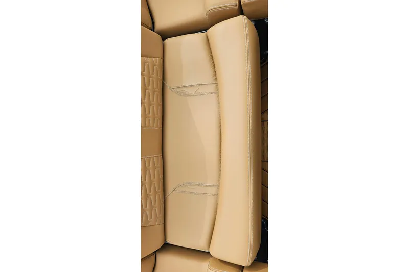 Slide: The Image of Tan leather seating detail in 2020 MasterCraft X24 boat interior. - 51