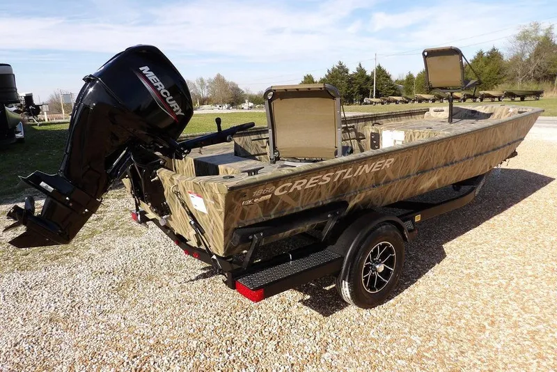 Slide: The Image of 2026 Crestliner 1860 Retriever Deluxe boat with Mercury engine on trailer. - 17