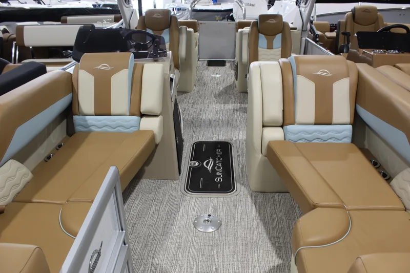 Slide: The Image of Luxurious interior of 2026 SunCatcher DIAMOND ARCH ELITE 324RC pontoon boat with plush seating. - 2