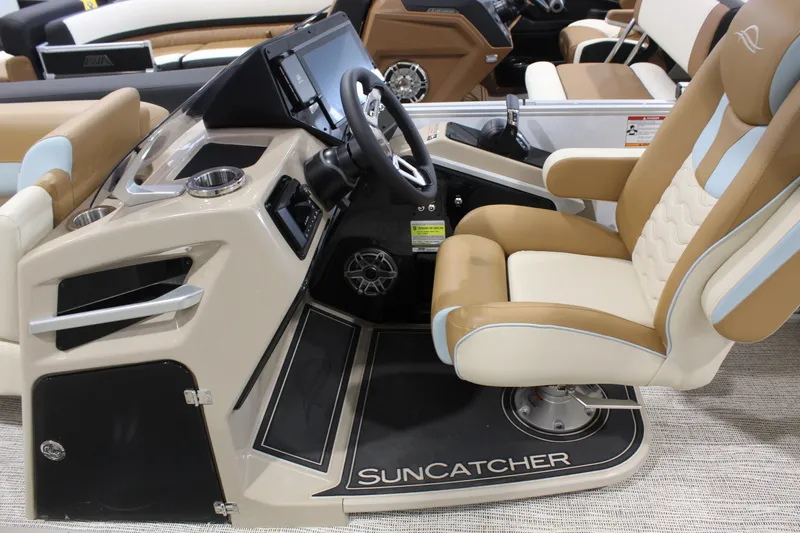 Slide: The Image of 2026 SunCatcher DIAMOND ARCH ELITE 324RC boat interior with steering console and luxurious seating. - 3