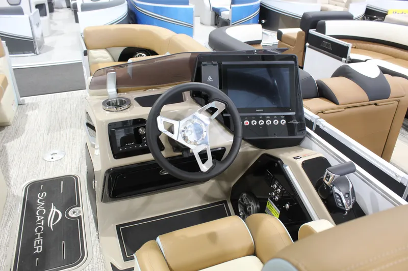Slide: The Image of Interior view of 2026 SunCatcher DIAMOND ARCH ELITE 324RC boat cockpit with steering wheel and controls. - 4