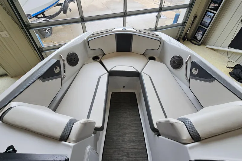 Slide: The Image of Interior of 2021 Scarab 195 ID boat with white seating and modern design. - 15