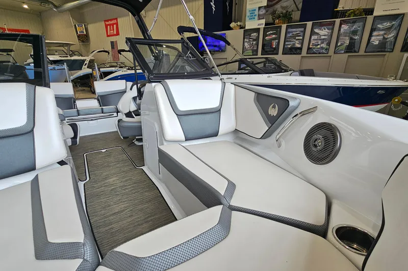 Slide: The Image of Interior of 2021 Scarab 195 ID boat, featuring sleek seating and modern design elements. - 17