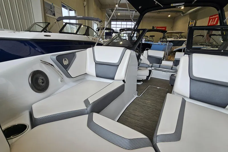 Slide: The Image of Interior of 2021 Scarab 195 ID boat with modern seating and sleek design. - 18