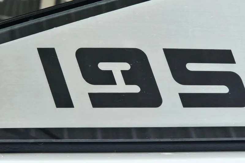Slide: The Image of Close-up of Scarab 195 ID 2021 model logo on boat surface. - 26