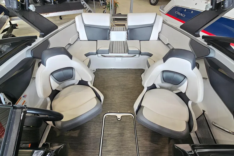Slide: The Image of Interior of 2021 Scarab 195 ID boat with modern seating and sleek design. - 6