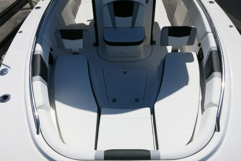 Slide: The Image of 2026 Robalo R270 Center Console boat interior with sleek seating and modern design. - 24