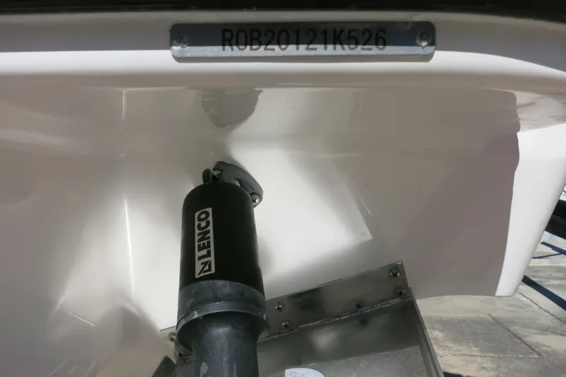 Slide: The Image of 2026 Robalo R270 Center Console boat hull with Lenco trim tab actuator. - 32