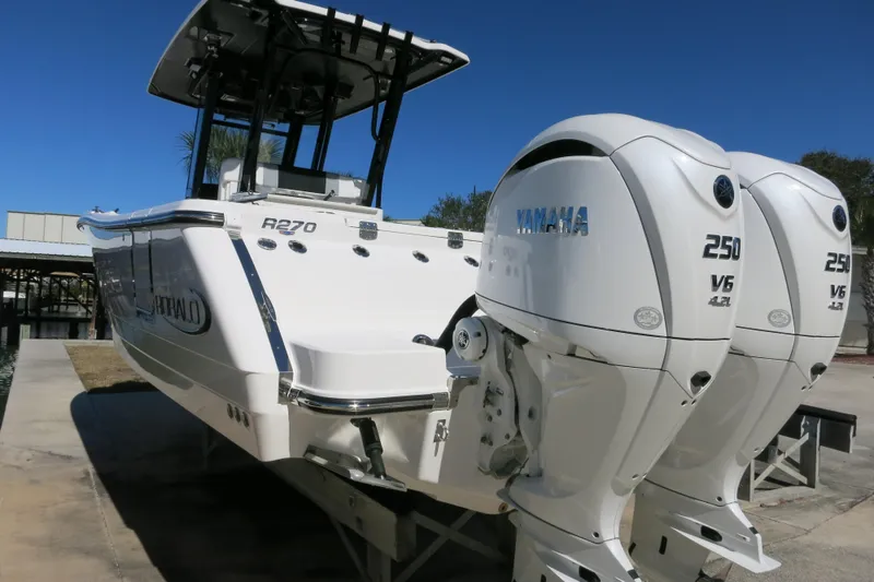 Slide: The Image of 2026 Robalo R270 Center Console boat with twin Yamaha 250 V6 engines. - 7