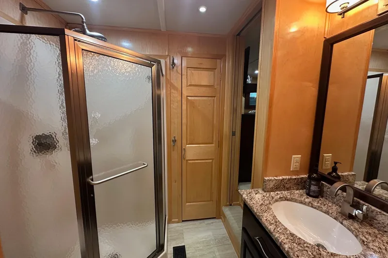 Slide: The Image of Bathroom interior of 2013 Sumerset 18x85 houseboat with shower and sink. - 14