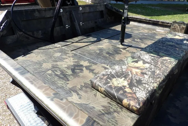 Slide: The Image of 2026 Crestliner 1760 Retriever FCC boat with camouflage interior design. - 10