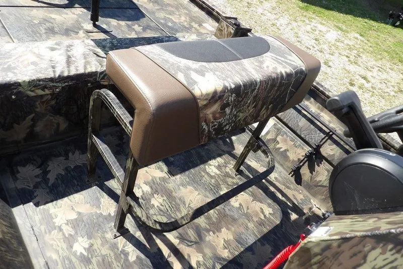 Slide: The Image of 2026 Crestliner 1760 Retriever FCC boat interior with camo seating and flooring. - 15