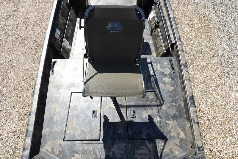 Slide: The Image of 2026 Crestliner 1760 Retriever FCC boat with camouflage deck and central seating. - 21