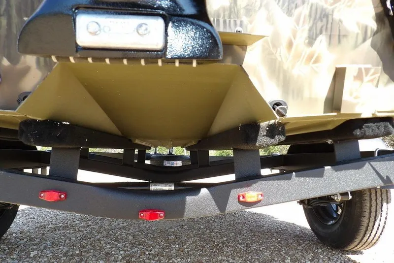 Slide: The Image of Bottom view of 2026 Crestliner 1760 Retriever FCC boat on trailer. - 25