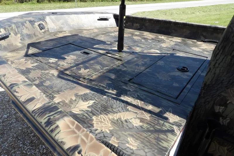 Slide: The Image of 2026 Crestliner 1760 Retriever FCC boat with camouflage pattern deck. - 32