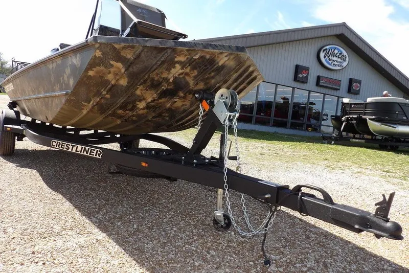 Slide: The Image of 2026 Crestliner 1760 Retriever FCC boat on trailer outside dealership. - 35