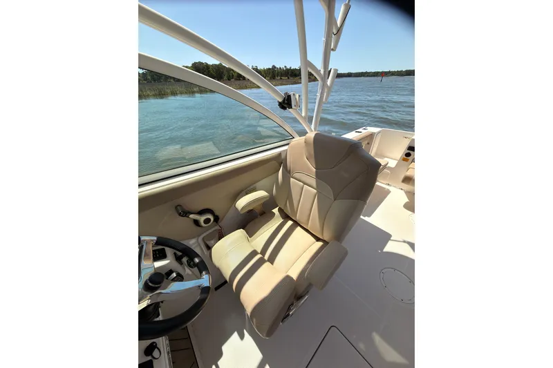 Slide: The Image of Dashboard of 2018 Sailfish 245 DC boat with GPS navigation system. - 11