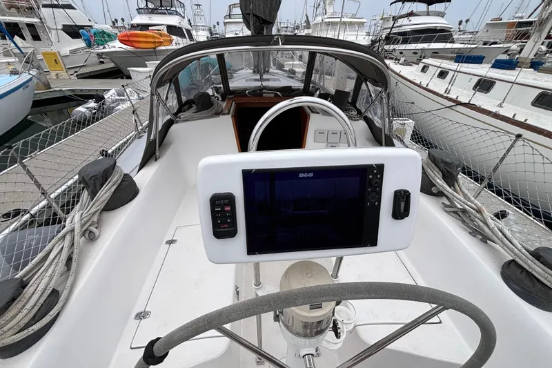 Slide: The Image of Cockpit view of 1979 Islander Peterson 40 sailboat with navigation equipment. - 11